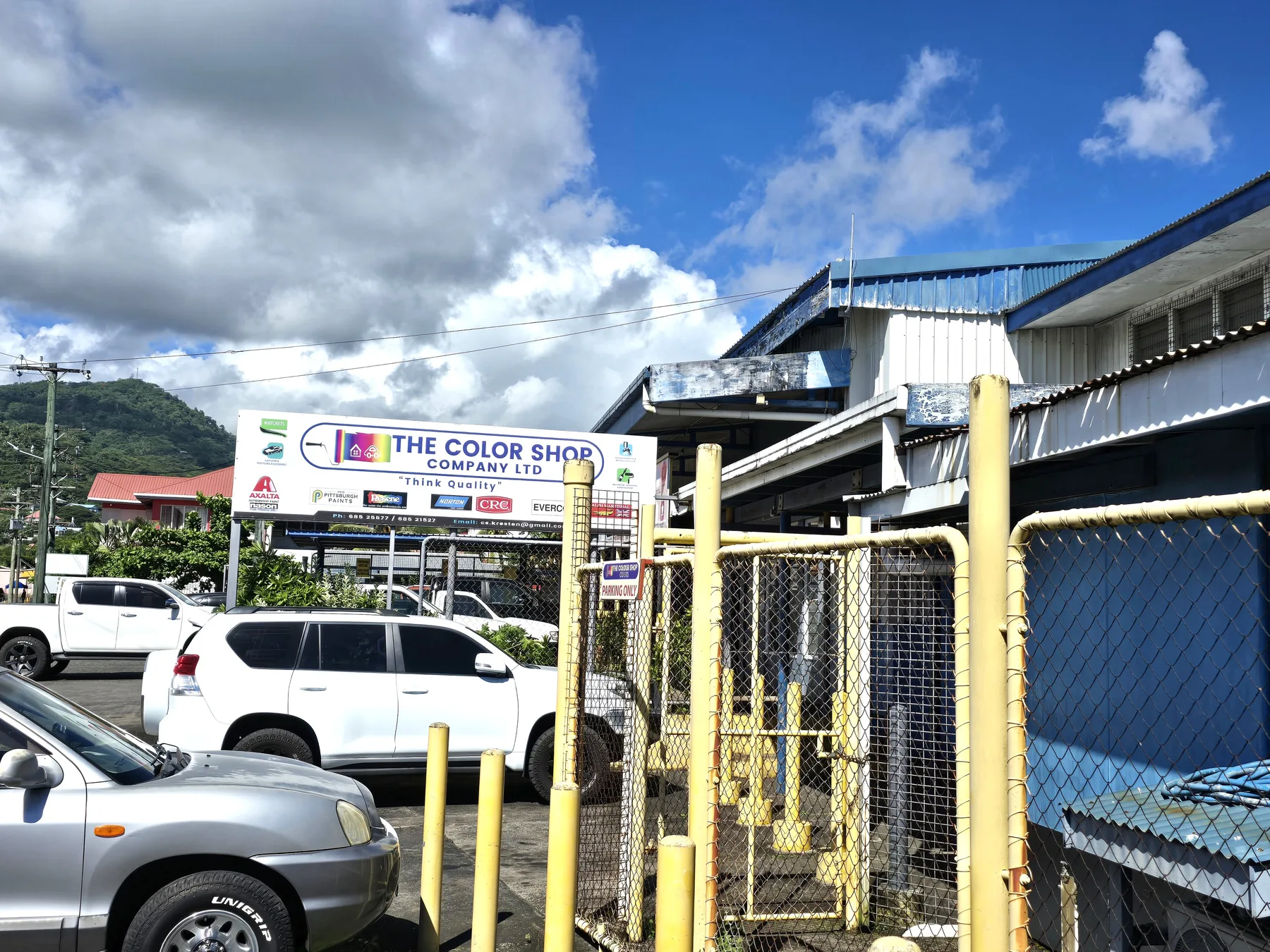 The Color Shop building and sign viewed from the side.